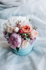 Beautiful spring bouquet with tender flowers in box