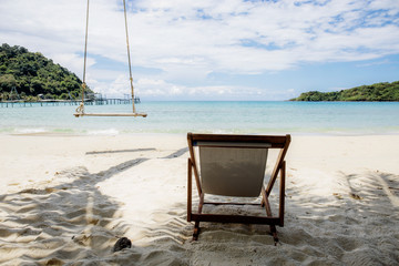 Chair for relaxing on beach.