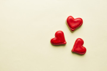 Cookies in heart shape with red glaze , valentines day celebration 