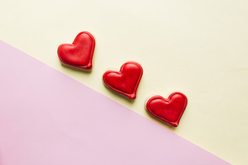 Cookies in heart shape with red glaze , valentines day celebration 