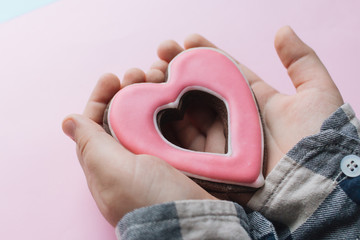 Fototapeta premium Cookie in heart shape with red glaze