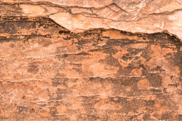 Big Rough stone with rugged crack surface. And there is moss on rock surface Occur naturally.