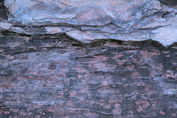 Big Rough stone with rugged crack surface. And there is moss on rock surface Occur naturally.
