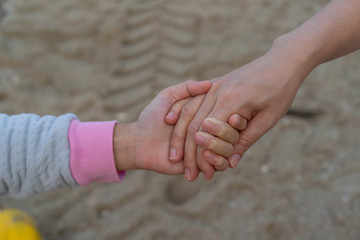 Asian little girl Mother Holding hands Walking