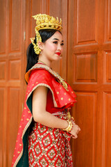 Thai teenage girls in traditional Thai dance costumes