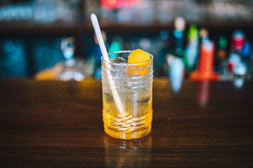 Yellow Alcoholic Cocktail Drink on the Bar Desk