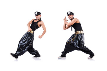 Rap dancer in wide pants on white
