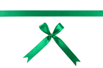 Beautiful green ribbon with bow isolated on white background.