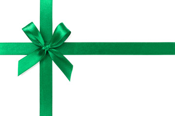 Beautiful green ribbon with bow isolated on white background.