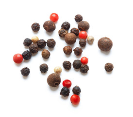 black pepper and color pepper isolated on white background