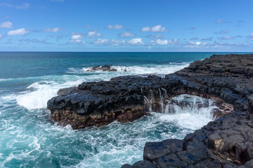 waves crashing on rocks
