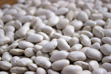 Lots of white large beans, background. Useful legumes