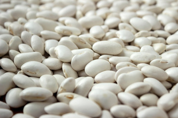 Lots of white large beans, background. Useful legumes