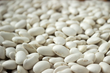 Lots of white large beans, background. Useful legumes