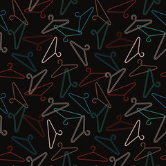 Seamless pattern. Hangers on a black background. Vector illustration