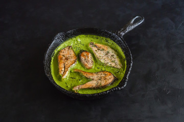 Green curry dish. Fish in spicy green curry. 