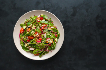 Fresh Red Shard Salad with quinoa and tomatoes. 