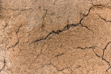 Cracked mud wall Peruvian home