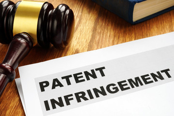 Patent infringement and gavel. Copyright law concept. - obrazy, fototapety, plakaty