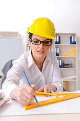 Female architect working in the office