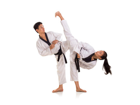 Young Male And Female Taekwondo Masters Sparring Session