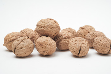 Walnut on a white scene