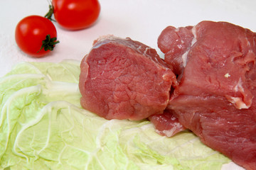 raw meat and vegetables