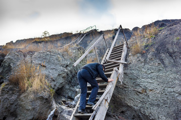 Old wooden stairs of an abandoned coal mine