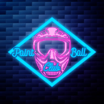 Vintage paintball emblem glowing neon sign on brick wall background