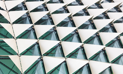 Abstract close-up view of modern aluminum ventilated facade of triangles 3d illustration