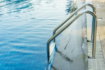 Swimming pool with handrails or ladder at hotel