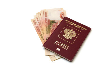 Fototapeta premium Isolated Russian passport and a pack of five thousandth ruble banknotes on white background