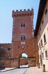 Castle with tower and city gate of Bolgheri, Tuscany, Italy