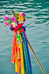 Flowers and garlands to show respect to Phra Mae Kongka 