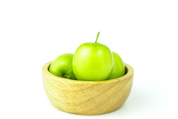 apple monkey or jujub (Zizyphus mauritiana Lam) isolated green fruit in wooden cup on white background and clipping path.