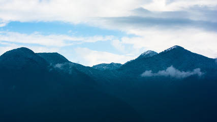Fototapeta premium Snowfall, snow covered hill pick from Kathmandu, Nepal, 9 Feb, 2019