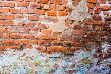 Cracked concrete vintage wall background, old brick wall