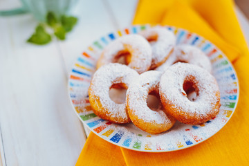 Homemade donuts with icing sugar