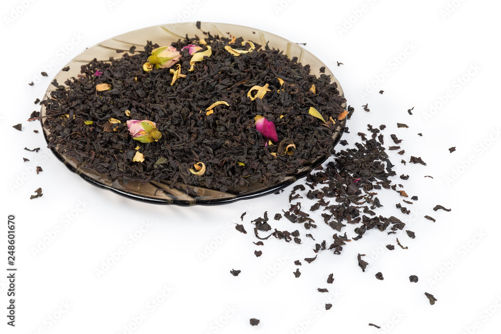 Wall mural tea leaves with chinese rose buds on saucer and beside