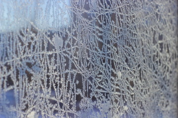 The patterns made by the frost on the window (hoarfrost background)