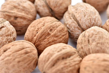 Walnuts on a white background.