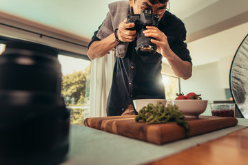 Professional food photographer in studio