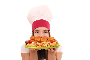 Happy girl cook with chicken nuggets and french fries portion