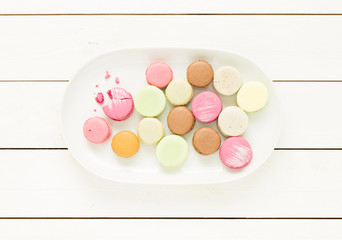 Dessert - pastel french macarons cakes on rustic white