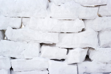 The wall is built of snow blocks