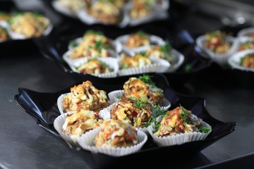 close up.meat muffins in the forms on the table in the restaurant