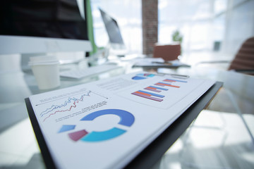 closeup.financial chart on the table from a businessman