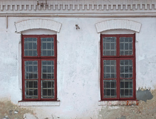 Fototapeta na wymiar old authentic windows on the facades of the houses of the city of Drohobych, Ukraine. 