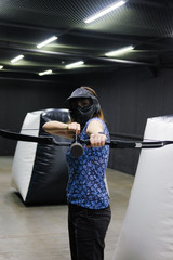 Girl with crossbow arrows bow. The Archer takes aim, sharpshooter. Crossbow club.