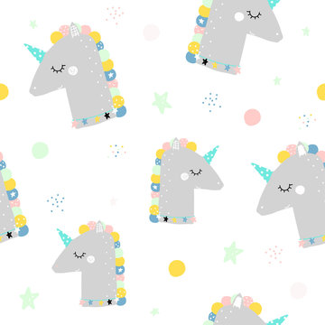 Seamless pattern with cute unicorn. Magic kids print. Vector hand drawn illustration.